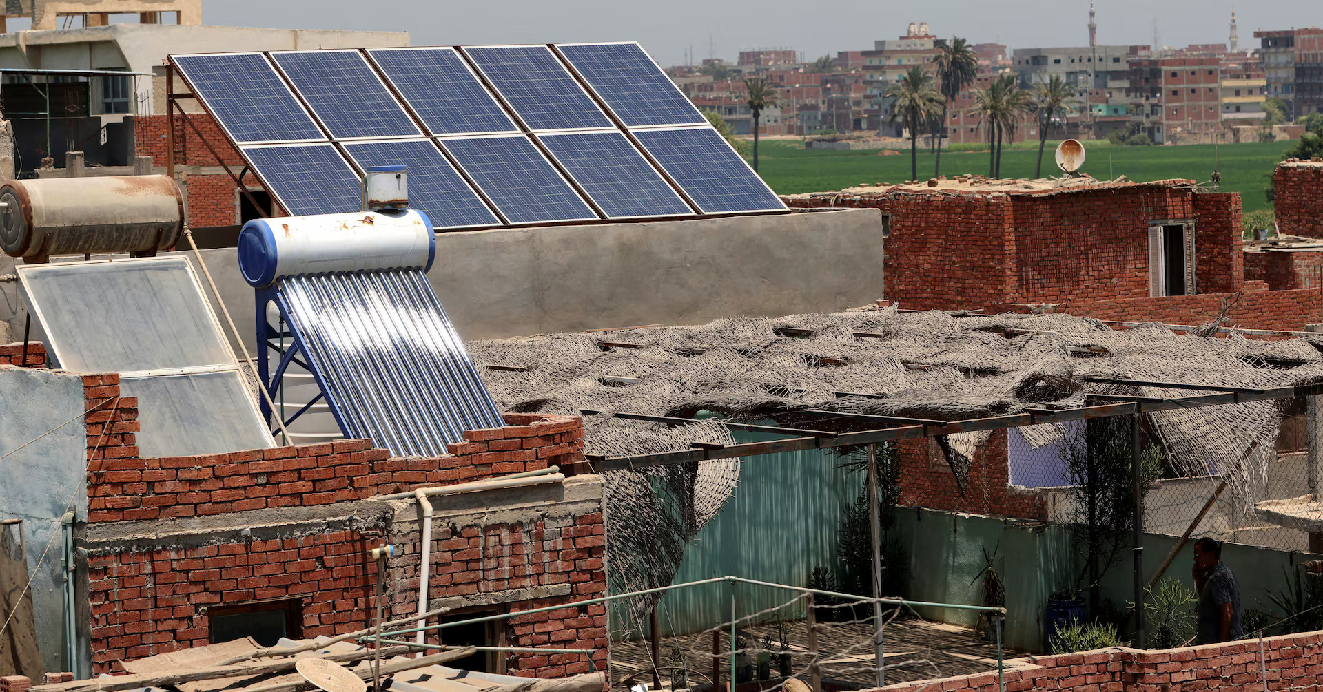  A structure in Puskar, Rajasthan, equipped with solar panels, highlighting advancements in sustainable architecture.